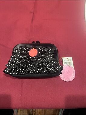 Lesportsac Black Polka Dot Ruffle Clutch with Coral Button